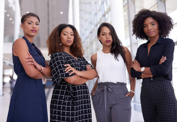 Portrait of a group of young businesswomen working together in a modern office